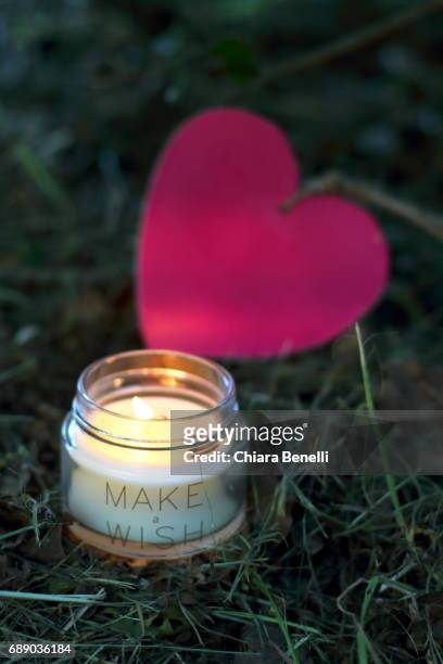 candle and heart - controluce stock pictures, royalty-free photos & images