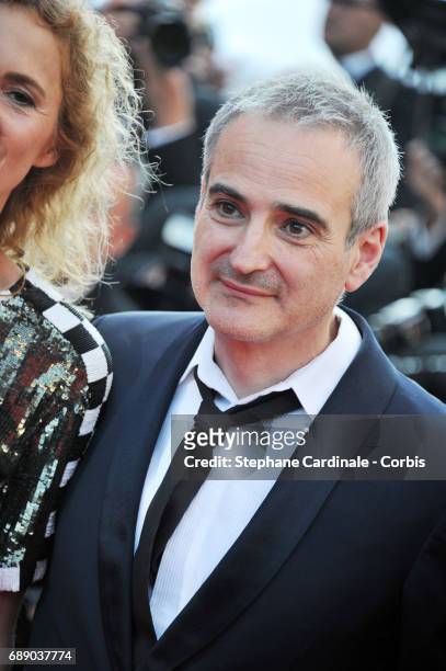 Director Olivier Assayas attends the "Based On A True Story" premiere during the 70th annual Cannes Film Festival at Palais des Festivals on May 27,...