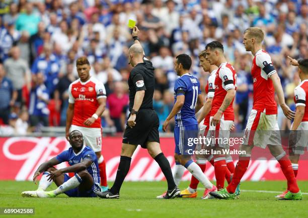 Victor Moses of Chelsea is show his second yellow by referee Anthony Taylor during The Emirates FA Cup Final between Arsenal and Chelsea at Wembley...