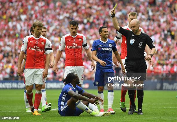 Victor Moses of Chelsea is show his second yellow by referee Anthony Taylor during The Emirates FA Cup Final between Arsenal and Chelsea at Wembley...