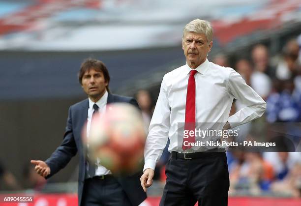 Chelsea manager Antonio Conte and Arsenal manager Arsene Wenger on the touchline during the Emirates FA Cup Final at Wembley Stadium, London.