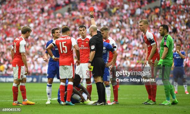 Victor Moses of Chelsea is shown a red card by referee Anthony Taylor during the Emirates FA Cup Final between Arsenal and Chelsea at Wembley Stadium...