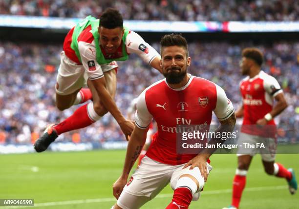 Olivier Giroud of Arsenal and Francis Coquelin of Arsneal celebrate their sides second goal during the Emirates FA Cup Final between Arsenal and...