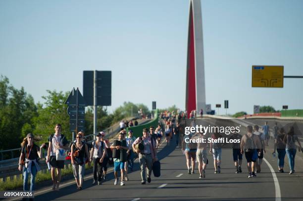 Participants walk towards the Elbe meadows for the "Night of the lights" on May 27, 2017 in Wittenberg, Germany. Up to 200,000 faithful are expected...