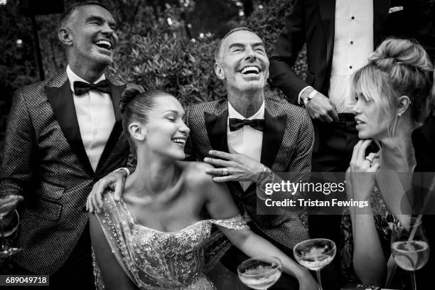 Dan Caten, Bella Hadid, Dean Caten and Hailey Clauson attend the amfAR Gala Cannes 2017 at Hotel du Cap-Eden-Roc on May 25, 2017 in Cap d'Antibes,...