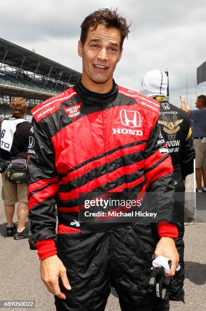 Good Morning America correspondent Rob Marciano reacts after his IndyCar two seater lap at Indianapolis Motor Speedway on May 27, 2017 in...