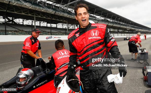 Good Morning America correspondent Rob Marciano reacts after his IndyCar two seater lap at Indianapolis Motor Speedway on May 27, 2017 in...