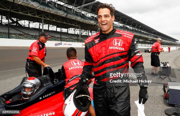 Good Morning America correspondent Rob Marciano reacts after his IndyCar two seater lap at Indianapolis Motor Speedway on May 27, 2017 in...
