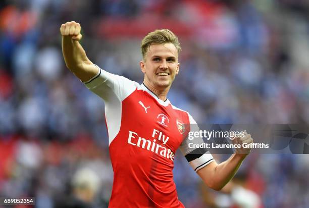 Rob Holding of Arsenal celebrates after The Emirates FA Cup Final between Arsenal and Chelsea at Wembley Stadium on May 27, 2017 in London, England.