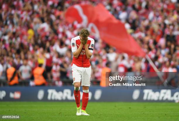 Rob Holding of Arsenal reacts to winning the FA Cup after The Emirates FA Cup Final between Arsenal and Chelsea at Wembley Stadium on May 27, 2017 in...