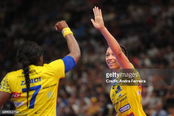 Beatrice Edwige of Metz and Grace Zaadi of Metz celebrate during the Women's handball National Cup Final match between Metz and Issy Paris at...