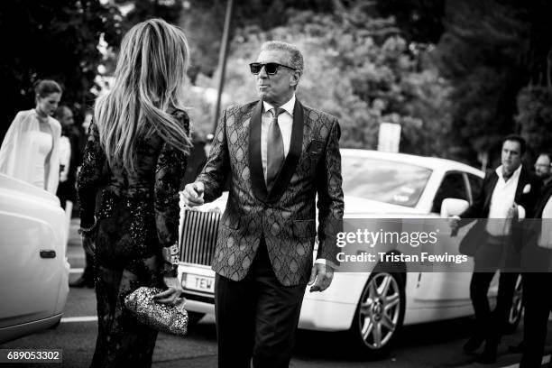 Lisa Tchenguiz and Steve Varsano arrive at the amfAR Gala Cannes 2017 at Hotel du Cap-Eden-Roc on May 25, 2017 in Cap d'Antibes, France.