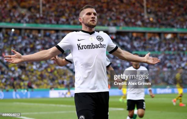 Ante Rebic of Frankfurt celebrates after scoring his team's first goal during the DFB Cup final match between Eintracht Frankfurt and Borussia...