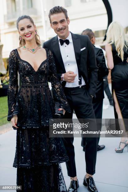 Caroline Scheufele and Jon Kortajarena attend the amfAR Gala Cannes 2017 at Hotel du Cap-Eden-Roc on May 25, 2017 in Cap d'Antibes, France.
