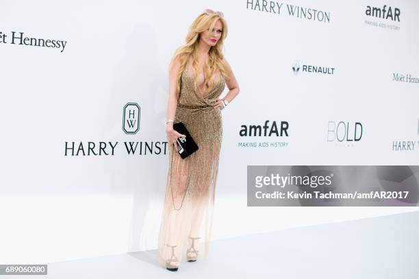 Audrey Tritto arrives at the amfAR Gala Cannes 2017 at Hotel du Cap-Eden-Roc on May 25, 2017 in Cap d'Antibes, France.