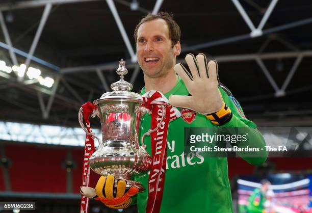Petr Cech of Arsenal poses with the FA Cup after the Emirates FA Cup Final between Arsenal and Chelsea at Wembley Stadium on May 27, 2017 in London,...