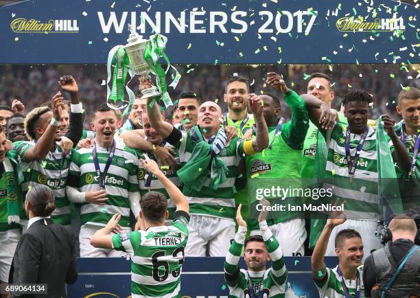 Scott Brown of Celtic lifts the trophy during the William Hill Scottish Cup Final between Celtic and Aberdeen at Hampden Park on May 27, 2017 in...