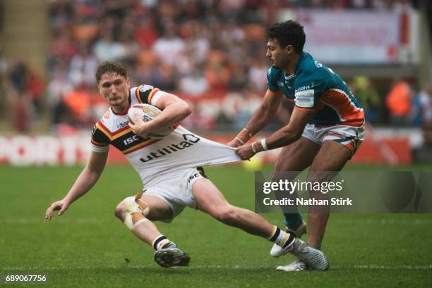 Ethan Ryan of Bradford Bulls and Kieran Moss of Hull KR in action during the Rugby League Summer Bash match between Hull KR and Bradford Bulls at...