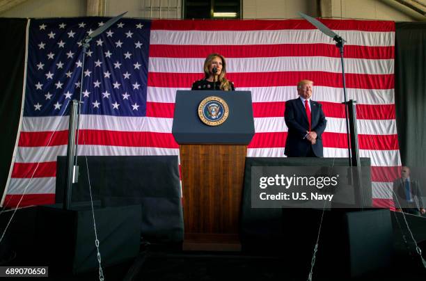 In this handout provided by U.S. Navy, First Lady Melania Trump introduces President Donald J. Trump to service members and their families at Naval...