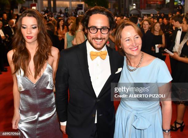Former French Ecology Minister, Segolene Royal , her son French lawyer Thomas Hollande and his partner journalist Emilie Broussouloux pose as they...