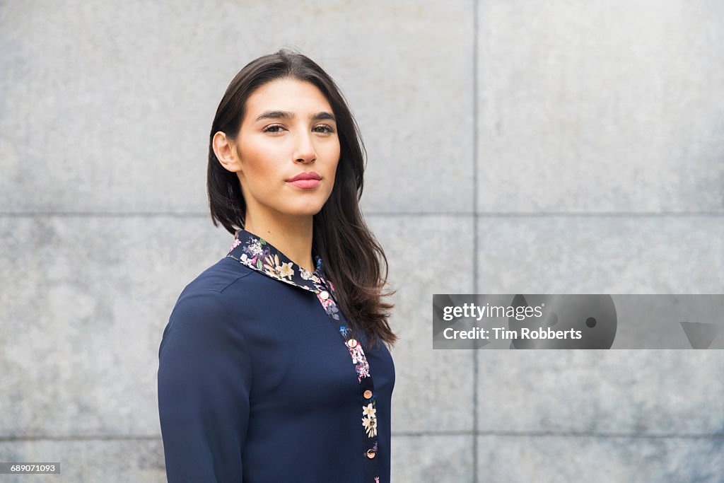 Portrait of woman looking at camera