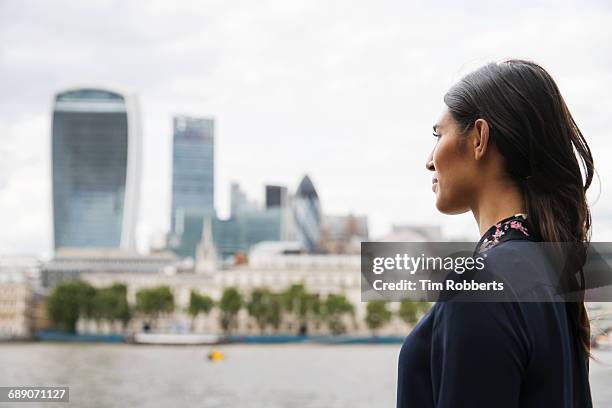 woman looking towards city - indian economy business and finance bildbanksfoton och bilder