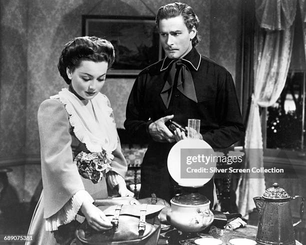 Actor Errol Flynn as George Armstrong Custer and Olivia de Havilland as Elizabeth Bacon in the film 'They Died with Their Boots On', 1941.