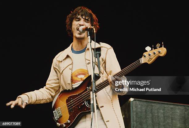 Canadian musician Rick Danko performing with rock group The Band, at Wembley Stadium, London, 14th, September 1974. The Band are supporting Crosby...