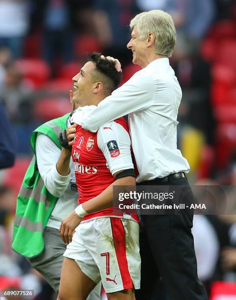 Arsene Wenger manager / head coach of Arsenal celebrates with Alexis Sanchez of Arsenal after the Emirates FA Cup Final match between Arsenal and...