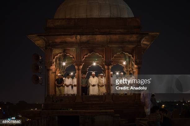 Muslims perform the first 'Tarawih' prayer on the eve of the Islamic Holy fasting month of Ramadan at Jama Masjid in Delhi, India on May 27, 2017.