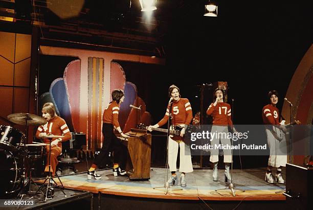 Scottish pop group The Bay City Rollers performing on the BBC TV music show 'Top Of The Pops', London, 7th March 1974. Left to right: Derek Longmuir,...