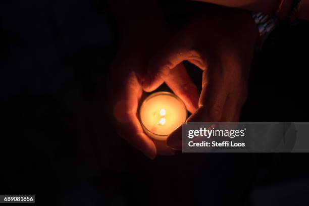 Pilgrims attend the "Night of the lights" at the Elbe meadows on May 27, 2017 in Wittenberg, Germany. Up to 200,000 faithful are expected to attend...