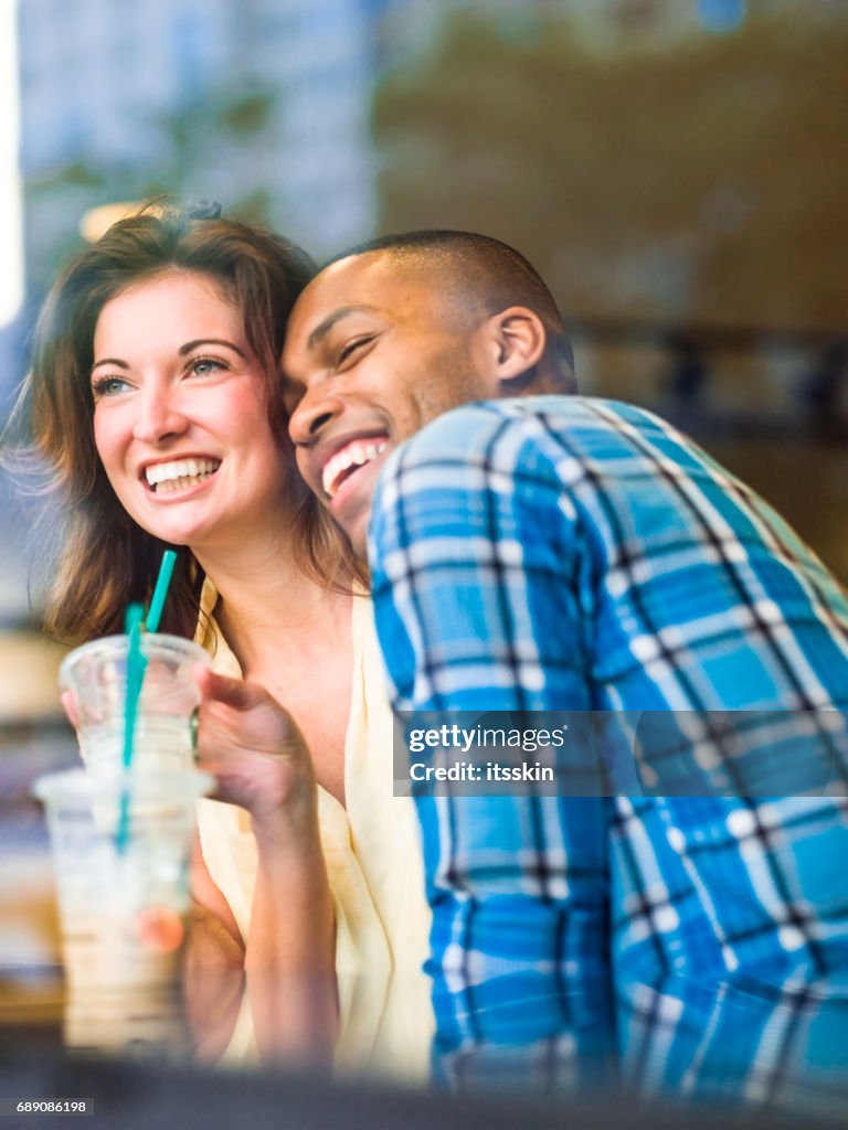 Mixed race couple in NYC cafe