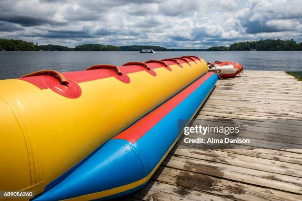 banana boat on muskoka lakes - alma danison stock pictures, royalty-free photos & images