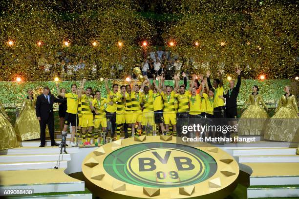 Team captain Marcel Schmelzer of Dortmund lifts the trophy after winning the DFB Cup Final 2017 between Eintracht Frankfurt and Borussia Dortmund at...