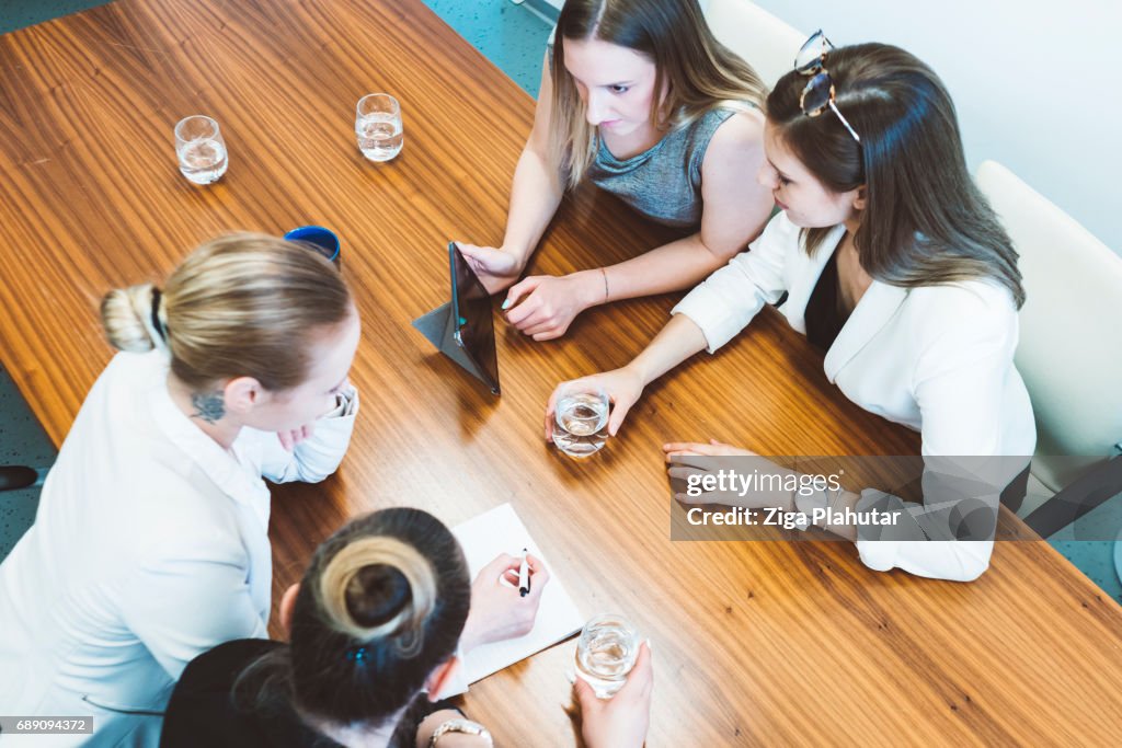 Group of young businesswoman having a meeting