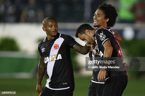 Players of Vasco celebrate a scored goal against Fluminense during a match between Vasco and Fluminense part of Brasileirao Series A 2017 at Sao...