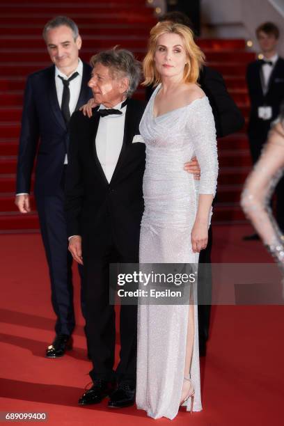 Director Roman Polanski, Olivier Assayas, Emmanuelle Seigner after the "Based On A True Story" screening during the 70th annual Cannes Film Festival...