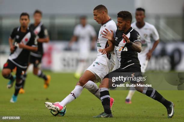 Henrique of Vasco struggles for the ball with Richarlison of Fluminense during a match between Vasco and Fluminense part of Brasileirao Series A 2017...