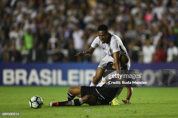 Luis Fabiano of Vasco struggles for the ball with Jefferson Orejuela of Fluminense during a match between Vasco and Fluminense part of Brasileirao...