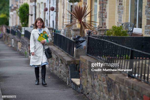 Leader of Plaid Cymru Leanne Wood walks passed terraced houses while door-to-door campaigning in Rhondda Cynon Taf on behalf of candidate Branwen...