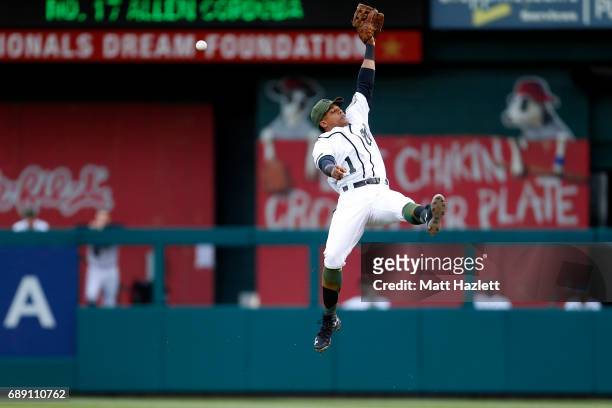 Wilmer Difo of the Washington Nationals misses a catch off of a single hit by Allen Cordoba of the San Diego Padres during the first inning at...