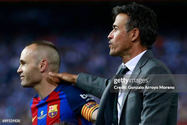 Head coach Luis Enrique Martinez of FC Barcelona hugs his captain Andres Iniesta after winning the Copa Del Rey Final between FC Barcelona and...