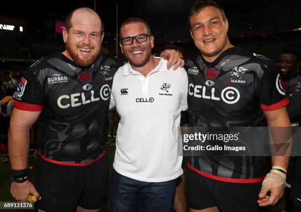Lourens Adriaanse with Jaco Pienaar of the Cell C Sharks and Coenie Oosthuizen of the Cell C Sharks during the Super Rugby match between Cell C...