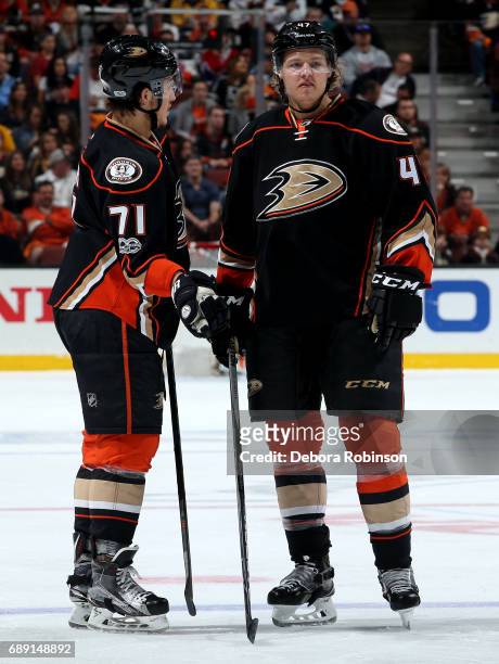 Hampus Lindholm and Brandon Montour of the Anaheim Ducks look on during the game against the Nashville Predators in Game Five of the Western...