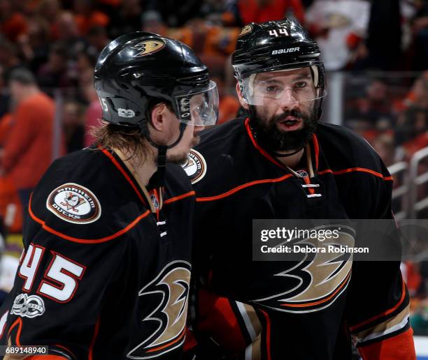 Nate Thompson and Sami Vatanen of the Anaheim Ducks talk the game against the Nashville Predators in Game Five of the Western Conference Final during...