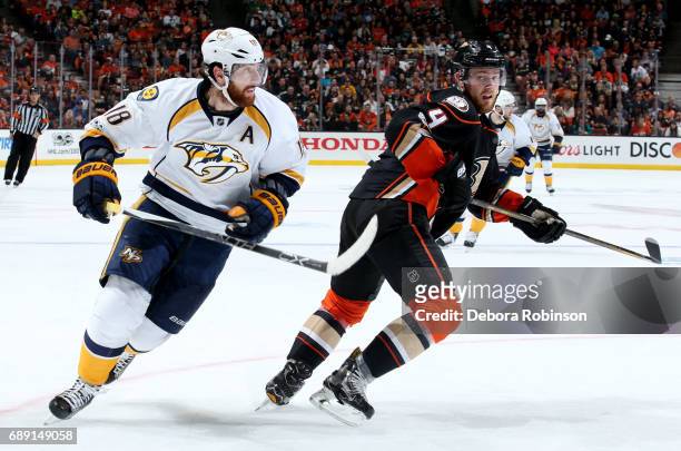 James Neal of the Nashville Predators skates against Cam Fowler of the Anaheim Ducks in Game Five of the Western Conference Final during the 2017 NHL...