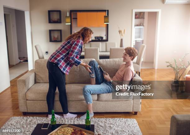 teenagers having fun at home - dvd player stock pictures, royalty-free photos & images
