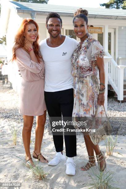 Yasmina Filali, Daniel Aminati and Marie Amière during Til Schweiger's opening of his 'Barefoot Hotel' on May 28, 2017 in Timmendorfer Strand,...