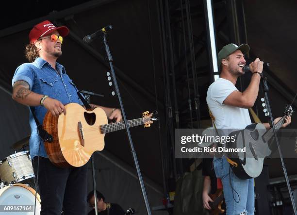 Love and Theft's Stephen Barker Liles and Eric Gunderson perform at Tree Town Music Festival - Day 3 on May 27, 2017 in Heritage Park, Forest City,...